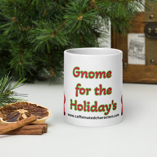 Front facing 20 oz mug that says Gnome for the Holidays in red font with a green outline in big letters and www.caffeinatedcharacters.com under that