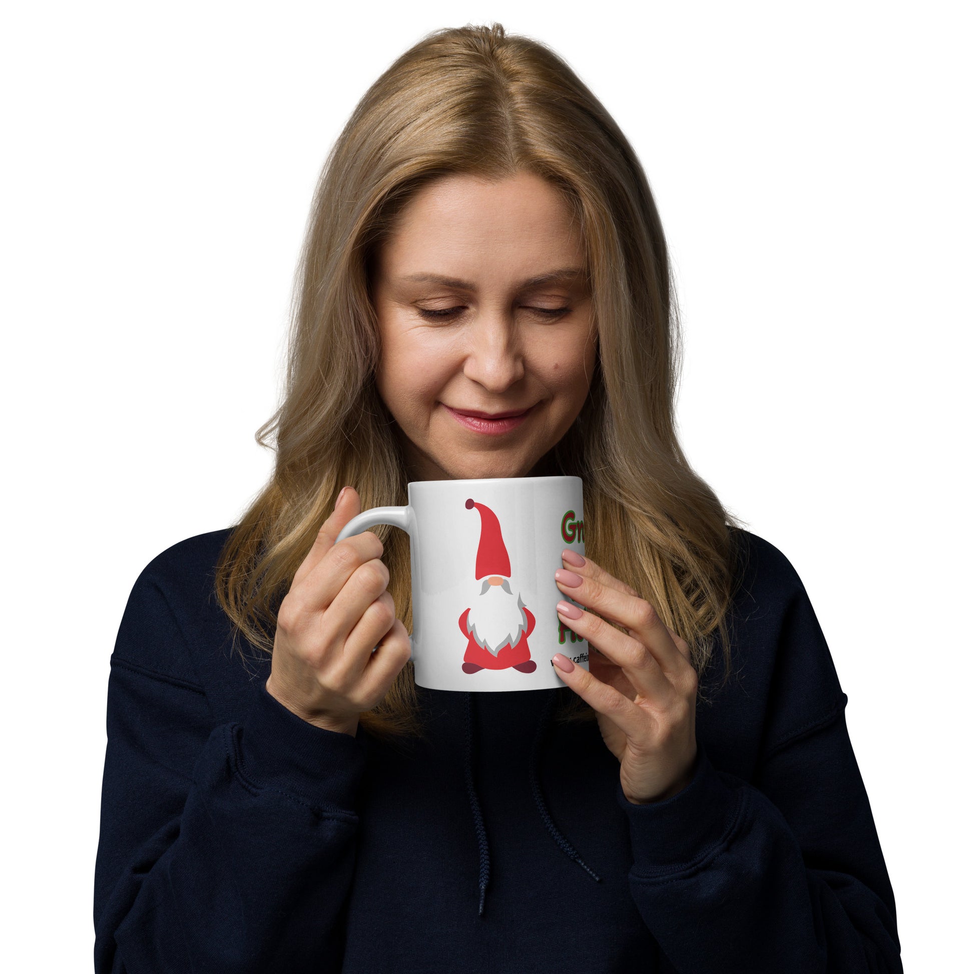 Woman holding a 20 oz white glossy mug with the gnome printed on the side dressed in red
