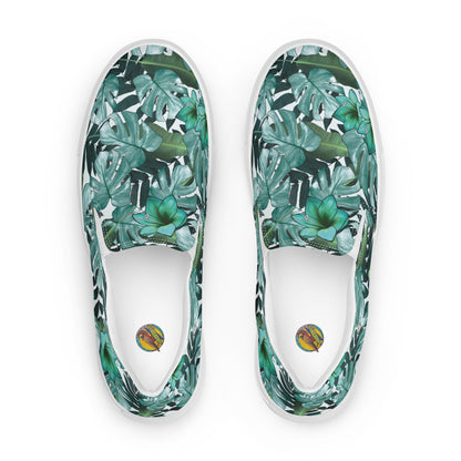 multicolor green tropical print canvas slip on shoes top view showing insole with Surf Designs By Herb Bradley Glid -n- Slide colored logo of a pelican