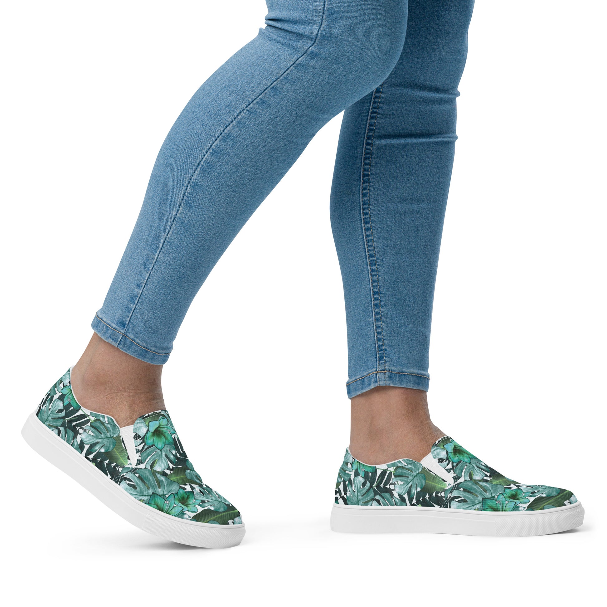 multicolor green tropical print canvas slip on shoes right side view woman in jeans view