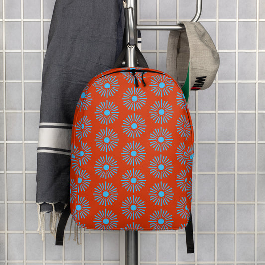 All over Floral Print Minimalist backpack front view hanging on a coat rack