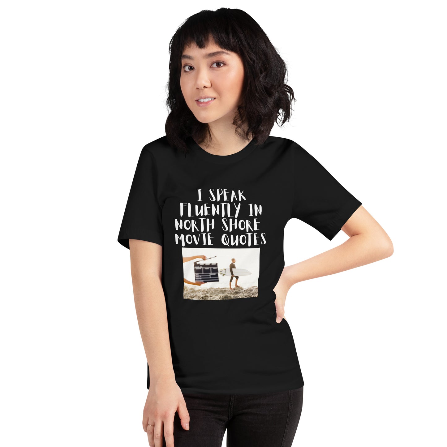 I speak in North Shore Movie Quotes in  large text, Picture of a Movie Scene Marker with Surfer holding a surfboard on the beach short sleeve t-shirt  in black