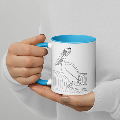 11oz Pelican Hanging Ten White mug with light blue color inside and on handle