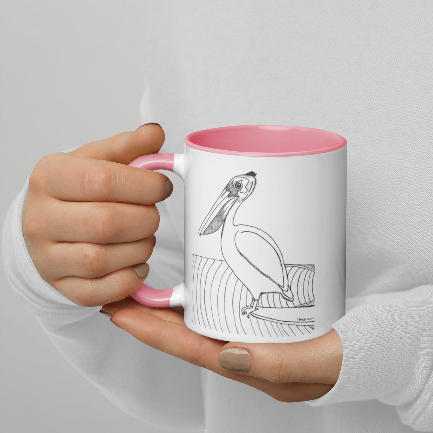 11oz Pelican Hanging Ten White mug with pink color inside and on handle