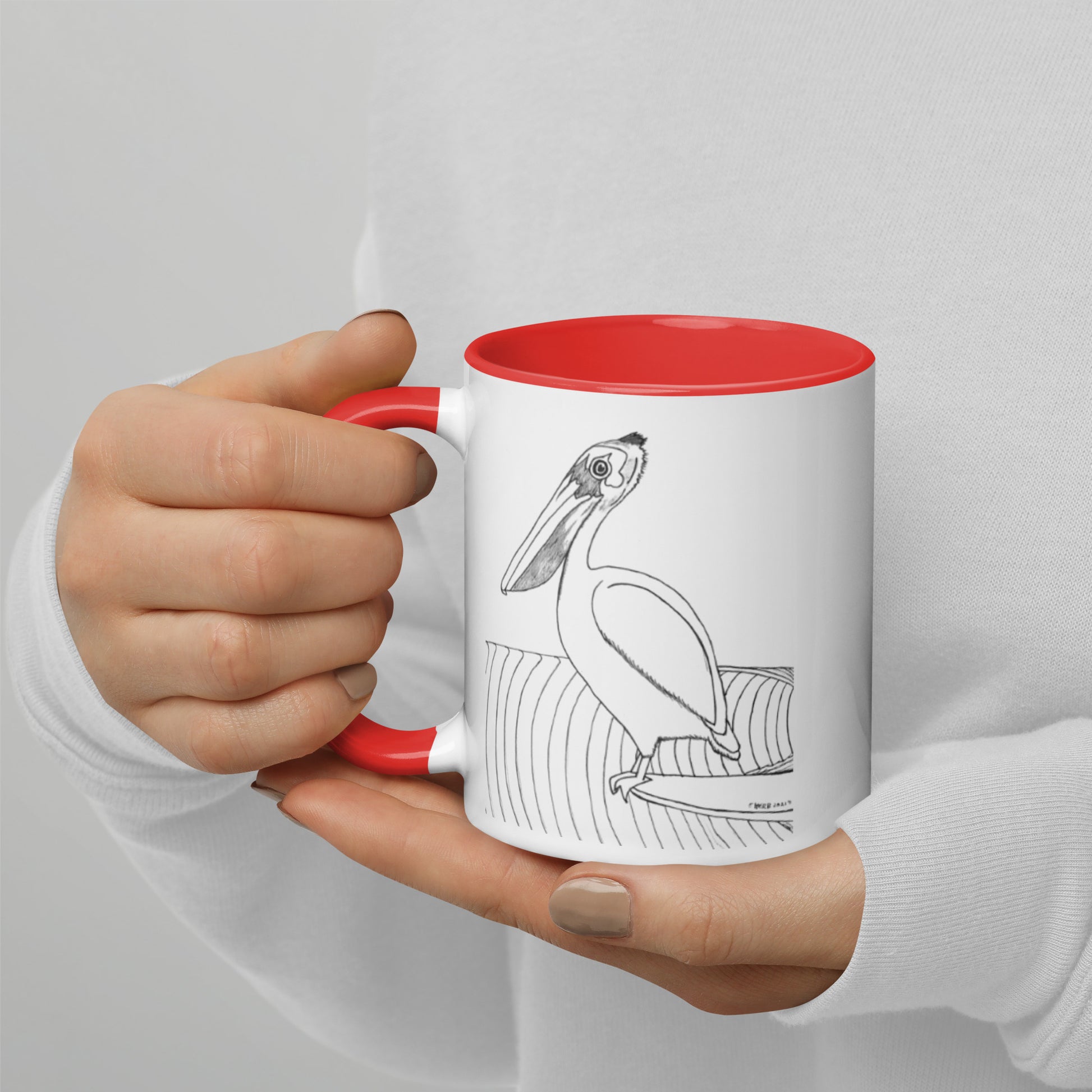 11oz Pelican Hanging Ten White mug with red color inside and on handle