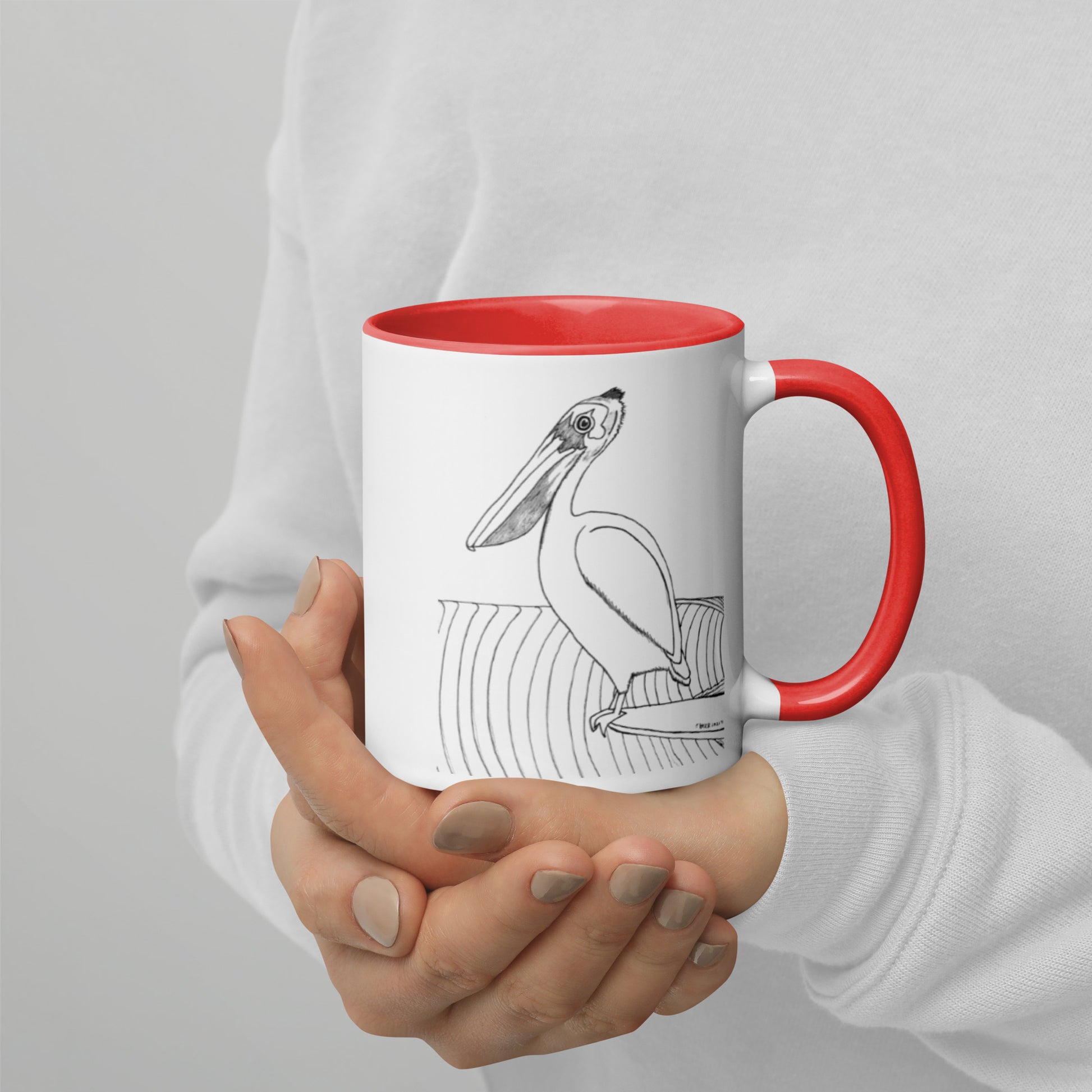 11oz Pelican Hanging Ten White mug with red color inside and on handle